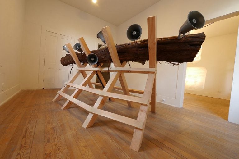 Center Pivot Installation: detail with tree trunk and speakers
